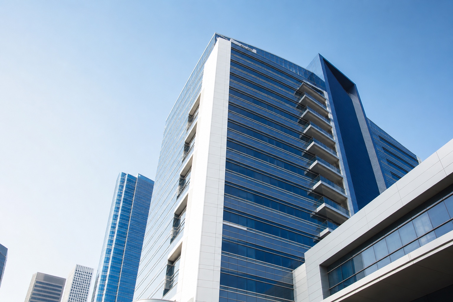 Contemporary office tower representing the commercial environments cared for by MCS Solutions