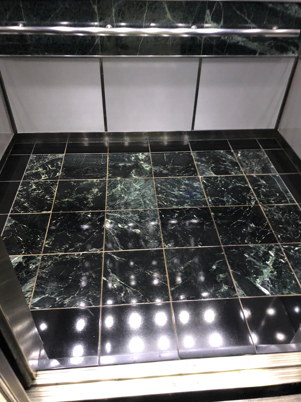 Polished elevator interior maintained by MCS Solutions